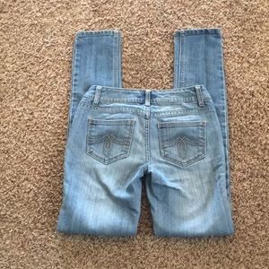 Faded blue skinny jeans